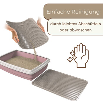 Rosa Katzentoilette mit grauer, strukturierter, herausnehmbarer Matte, die darüber ausgeschüttelt wird; deutscher Text 'Einfache Reinigung'.