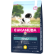 Eukanuba premium hondenvoer zak met een rennende hond, gelabeld "ADULT" voor middelgrote rassen, 3kg, rijk aan verse kip.