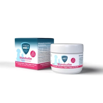 Wundsalbe für Haustiere, präsentiert in einem weißen Glas und einer blau-rosa Box, gekennzeichnet für Hunde, Katzen, Vögel, Nagetiere und Pferde.