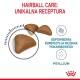 Obraz suchej karmy dla kotów oznaczonej "Hairball Care: Unikalna Receptura" z informacjami o składzie błonnika i psyllium.