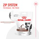 Royal Canin dog treats package featuring a Dalmatian, labeled "Low fat content, prebiotics and vitamin B12," 230g, with a zip system.