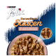 Purina Felix Sensations Katzenfutterverpackung mit Stücken von Lachs in Sauce, mit einer Nahaufnahme des Futters in einer rosa Schüssel.