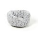 Weiches, rundes graues Hundebett mit plüschiger Textur, mit einem gemütlichen, gepolsterten Inneren.