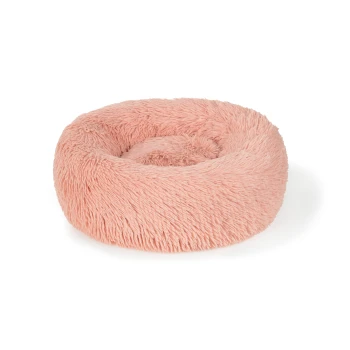 Lit rond moelleux pour animaux de couleur rose doux, conçu pour le confort et la détente.