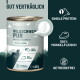 Dose Hundefutter mit Wildschweinfleisch-Zusammensetzung und Fütterungsempfehlungen, neben rohem Fleisch mit der Aufschrift „100 % Fleisch ohne Innereien“.