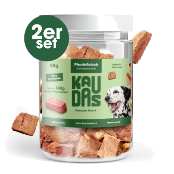 Hundeleckerlis in einem klaren Glas mit der Aufschrift "KAUDAS" und einem Dalmatinerbild, mit den Texten "Pferd", "Training & Belohnung" und "100% Fleisch."