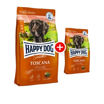 Sensible Trockenfutter Hund Adult, Toscana 12,5 kg + 1 kg Happy Dog Sensible Toscana Hundefutterverpackung mit einem großen Sack (11 kg) und einem kleineren Sack, mit einem Hundebild und dem Text "Ente & Lachs".