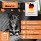 Hund auf einer Autositzbezug für Haustiere mit Öffnungen für Sicherheitsgurte, Kratzschutz, Reißfestigkeit und einfacher Installation.