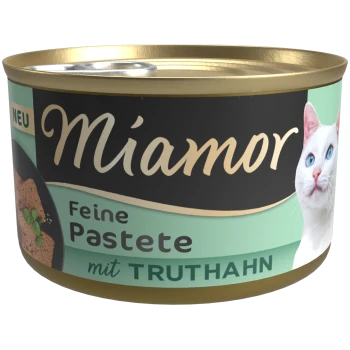 Miamor Katzenfutterdose mit Putenpastete, zeigt eine weiße Katze und den Text „Feine Pastete mit Truthahn“ und „NEU“ auf dem Etikett.