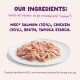 Plate of shredded salmon and chicken in broth with text: MSC salmon 30%, chicken 30%, broth, tapioca starch.
