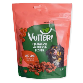 Vutter! vegane Hundesnacks mit Himbeere und rotem Rettich, pflanzlich, 110g, Bild eines Hundes, der sich die Lippen leckt, auf der Verpackung.