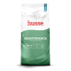 Eine Tüte Husse Hundefutter mit der Aufschrift "Mild", die ein glutenfreies Rezept mit Huhn und Forelle enthält und die optimale Darmgesundheit fördert.