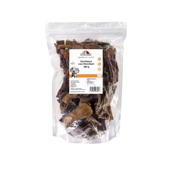 Tackenberg getrocknete flache Rinder-Hundesnacks 500 g in durchsichtigem wiederverschließbarem Beutel mit Etikett und Hundeillustration.