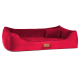 Rotes Plüschhaustierbett mit erhöhten Seiten und einem kleinen Rückenkissen, mit einem hellbraunen Etikett, das 'tierland' liest.