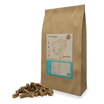 Braune Papiertüte mit Hundefutter, beschriftet mit 'montanus nature junior', mit einer Illustration eines Welpen, enthält 10 kg vollständige Ernährung für Welpen.