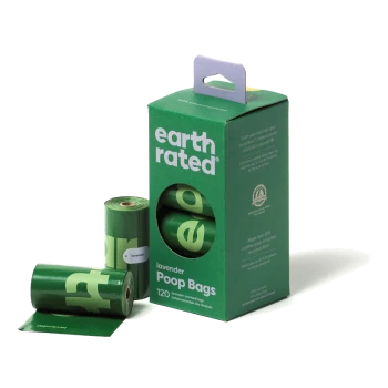 Boîte verte de sacs à crottes parfumés à la lavande Earth Rated, contenant 120 sacs, avec des rouleaux partiellement visibles et des revendications écologiques.