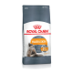 Sac de nourriture pour chats Royal Canin Hair & Skin, avec un fond gris, une illustration de chat et un texte mettant en avant le soutien pour une peau et un pelage sains.