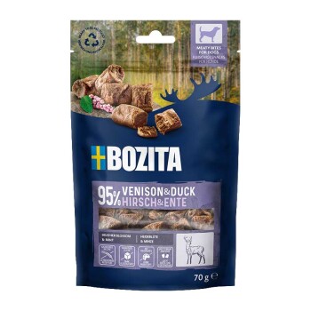 Blauer Bozita-Snackbeutel mit mundgerechten fleischigen Stücken, beschriftet mit '95% Venison & Duck', 'Meaty Bites for Dogs', '70 g'.