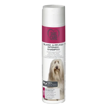Bouteille de shampooing intensif "Take Care" Glanz- & Pflege pour chiens, présentant un chien blanc sur l'étiquette, avec du texte en plusieurs langues.