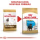Deux sacs Royal Canin pour "Junior Rottweiler" et "Puppy Rottweiler," avec une flèche rouge et le texte : "NOUVEAU LOOK, NOUVELLE FORMULE."