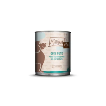 Pur Adult 6 x 800 g Dinde Une boîte de nourriture pour chiens MjAMjAM étiquetée "GUTE PUTE" avec une silhouette de chien brun, avec un texte indiquant qu'il s'agit de viande de dinde pure.