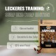 Verpackung für Haustierleckerlis "Leckeres Training: Surf und Turf Edition" mit den Hinweisen "Klein und handlich," "Getreidefrei," und "88% Fleisch."