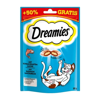 Dreamies Katzenleckerlipackung mit einer verspielten Katzenillustration, mit Text, der "mit schmackhaften Lachs" und "+50% GRATIS" hervorhebt.