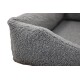 Nahaufnahme eines grauen Sherpa-Fleece-Haustierbett-Bolsters, die das weiche, strukturierte Schlaufenmaterial zeigt.