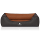 Stylisches Hundebett mit einem dunkelgrauen Äußeren und einem warmen braunen Inneren, mit dem Logo 'KNUFFELWUFFF' auf der Vorderseite.