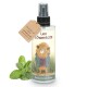 Eine Sprühflasche mit der Aufschrift "Leo Löwenkatz Katzenminze-Spray", die eine Cartoon-Löwenfigur in einem Mantel zeigt, mit Minzblättern daneben.