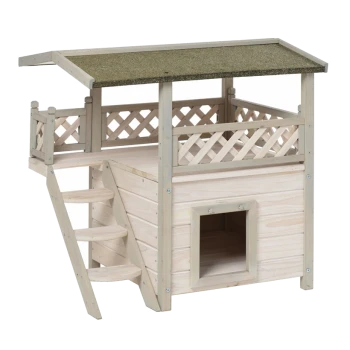 Maison pour animaux en bois avec un toit incliné, un balcon et des escaliers, avec une entrée confortable pour les animaux.