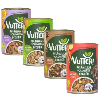 Vier Dosen Vutteri veganes Hundefutter, beschriftet mit Geschmacksrichtungen: Ente, Lamm, Wild und Rind, mit bunten Grafiken und Zutaten.