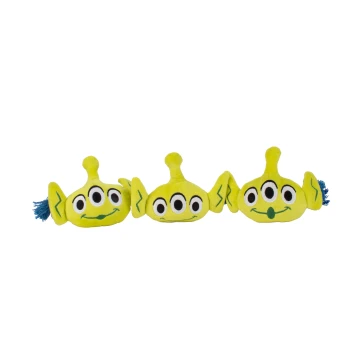 Three lime-green, three-eyed alien plush pet toys with antennae, floppy ears and blue tassels on black background.