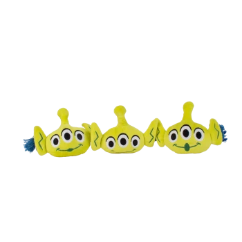 Three lime-green, three-eyed alien plush pet toys with antennae, floppy ears and blue tassels on black background.