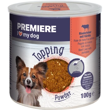 A can of PREMIERE dog food topping powder featuring a smiling dog on the label. The product is beef liver with pumpkin, 100g.