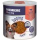 Une boîte de poudre de garniture pour nourriture pour chiens PREMIERE avec un chien souriant sur l'étiquette. Le produit est du foie de bœuf avec de la citrouille, 100g.