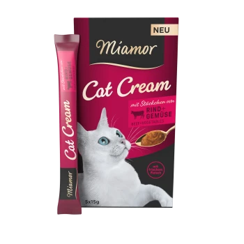 Emballage de Miamor Cat Cream présentant un chat blanc aux yeux bleus, étiqueté "mit Stückchen von Rind+Gemüse" (avec des morceaux de bœuf+légumes).