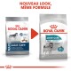 Deux sacs de nourriture pour chiens Royal Canin Joint Care avec un nouveau design et un texte sur l'amélioration du mouvement pour les grands chiens.