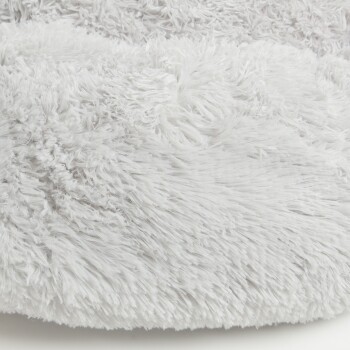 Flauschiges graues Haustierbett mit weichem, strukturiertem Stoff, ideal für den Komfort von Haustieren.