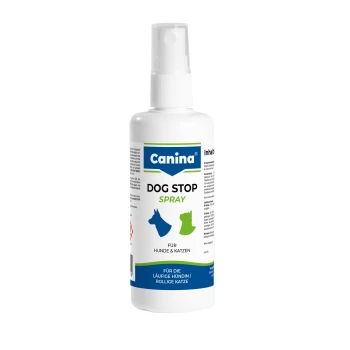 Weiße Canina Dog Stop Spray‑Flasche mit Aufschrift „DOG STOP SPRAY“, blauen und grünen Hunde-/Katzen‑Icons und Text „Für Hunde & Katzen“.