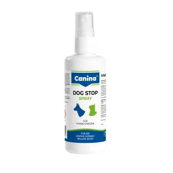Weiße Canina Dog Stop Spray‑Flasche mit Aufschrift „DOG STOP SPRAY“, blauen und grünen Hunde-/Katzen‑Icons und Text „Für Hunde & Katzen“.