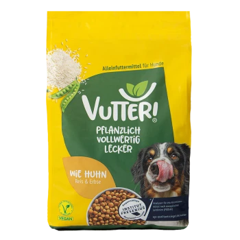 Tüte Vutter! veganes Hundefutter mit Reis und Erbsen, zeigt einen Hund, der sich die Nase leckt, und eine Schüssel mit Trockenfutter.