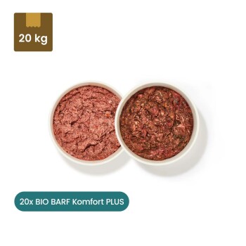 Zwei Pakete BARF Komfort PLUS Tiernahrung (Rind und Huhn) mit Schalen von rohem Fleischgemisch, gekennzeichnet mit Nährwertinformationen.
