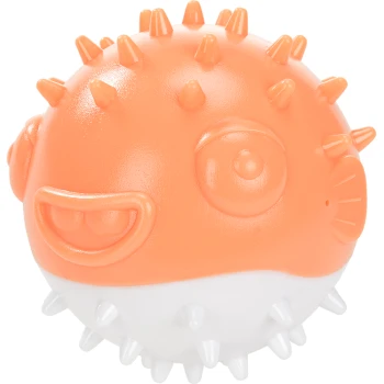 A playful orange and white spiky fish-shaped dog toy with a smiling face and large eyes, designed for pet entertainment.