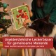 Adventskalender für Hunde mit einer verspielten Hundillustration, mit Text auf Deutsch: "Unwiderstehliche Leckerbissen - jeden Tag ein neuer Snack."