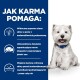 Pies z niebieską obrożą obok tekstu o korzyściach karmy dla psów: lepsza skóra, mniej drapania, poprawiona jakość snu.