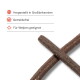 Zwei gekreuzte braune Kausticks für Hunde; sichtbarer Text: „Hergestellt in Großbritannien“, „Getreidefrei“, „Für Welpen geeignet“.