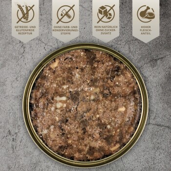 Runde Dose mit Tierfutter, die eine braune Mischung enthält, beschriftet mit "Getreide- und glutenfrei", "Keine Farbstoffe/konservierungsstoffe", "Natürlich", "Hoher Fleischanteil."