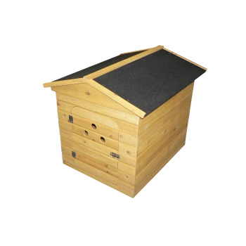 Wooden dog house with a slanted roof, featuring a side door and ventilation holes, designed for outdoor pet shelter.
