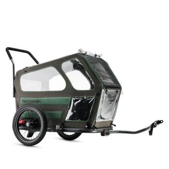 Grüner und schwarzer Fahrradanhänger für Haustiere mit transparenten Fenstern und Griff, für sicheren Transport von Haustieren konzipiert.